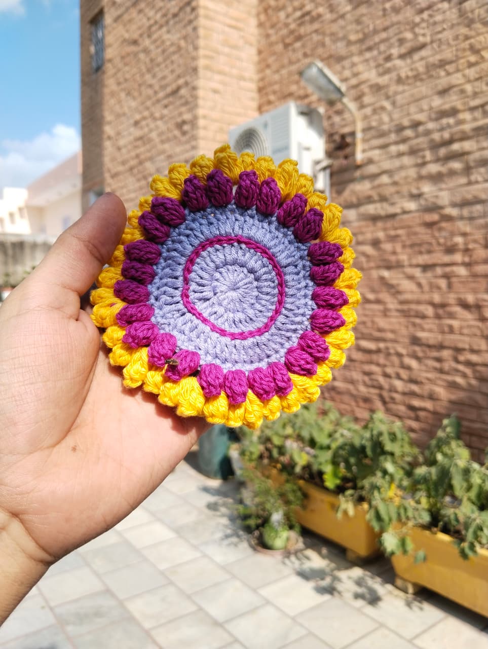 sunbloom crochet coasters β purple & yellow (set of 4) sunbloom crochet coasters β purple & yellow (set of 4)