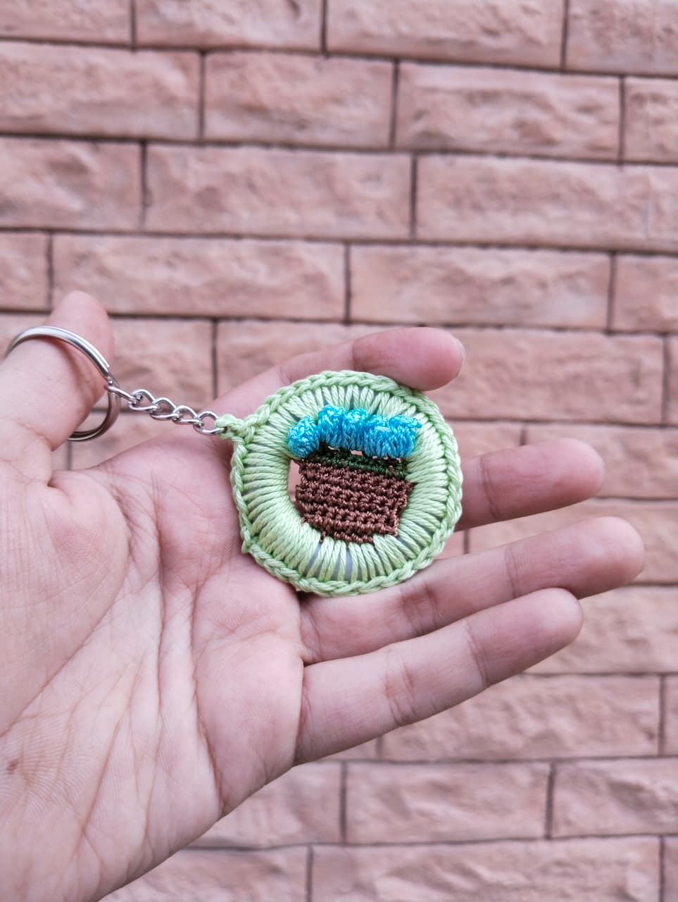 bloom basket crochet keychain – green border & blue flowers bloom basket crochet keychain – green border & blue flowers