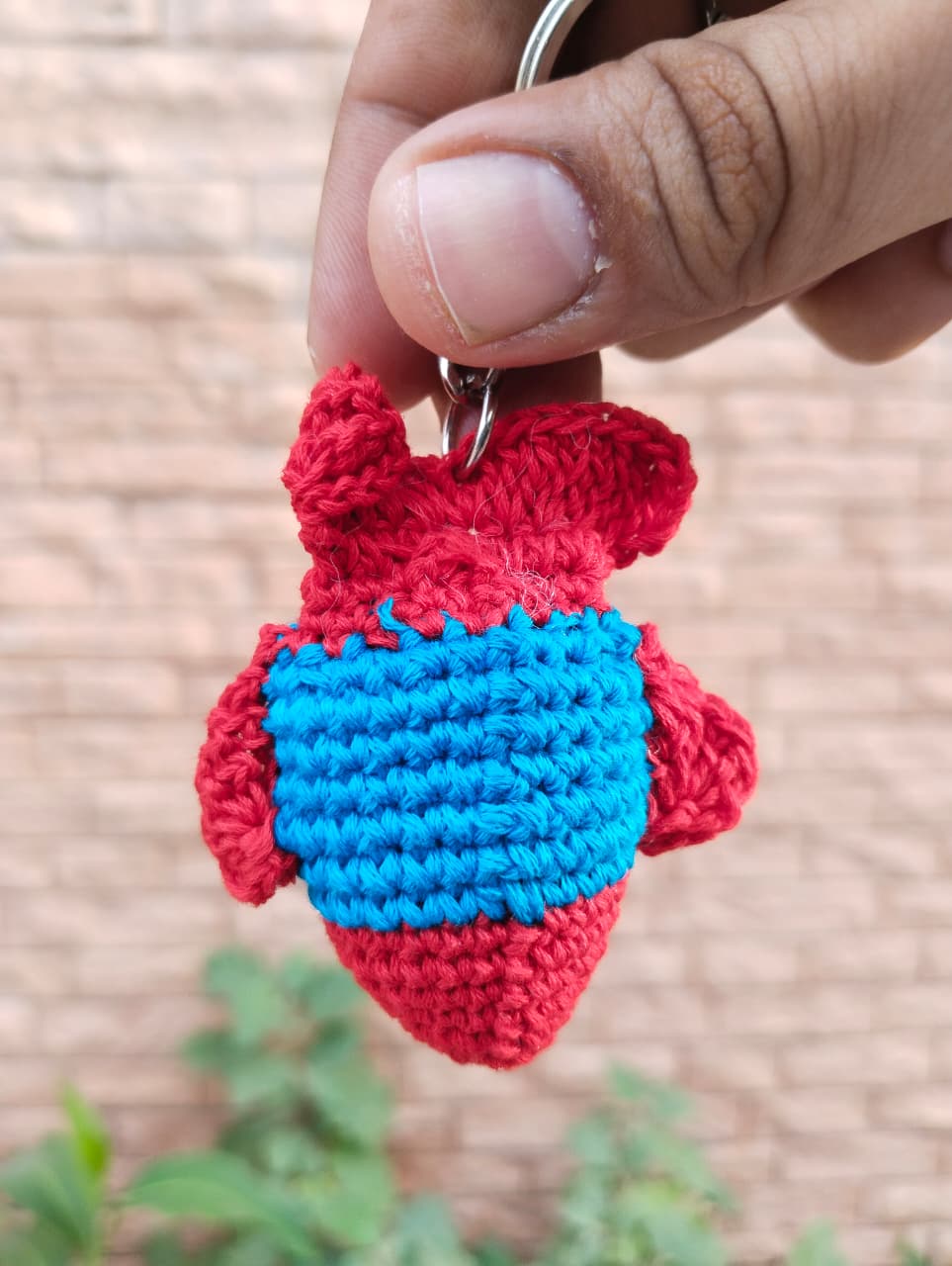 crochet puffer fish keychain – fire red/aqua (embroidered eyes) crochet puffer fish keychain – fire red/aqua (embroidered eyes)