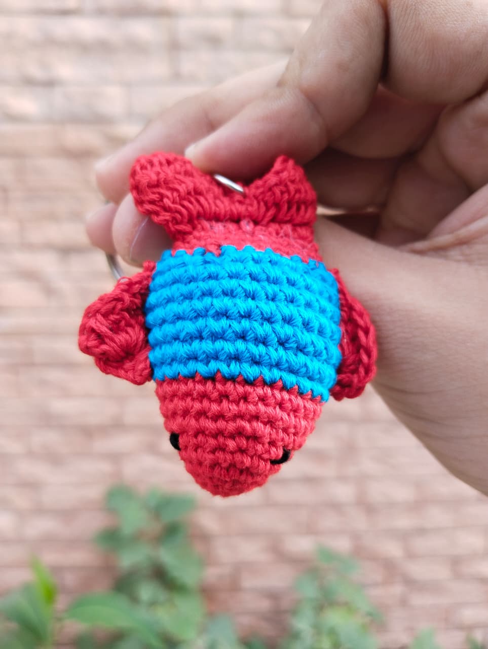 crochet puffer fish keychain – fire red/aqua (embroidered eyes) crochet puffer fish keychain – fire red/aqua (embroidered eyes)